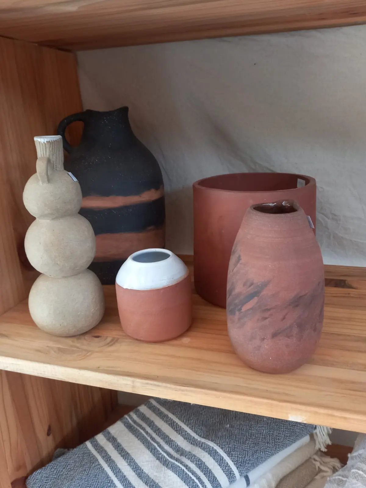 The welcoming entrance and window display of the Nest shop.